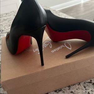 Black Christian Louboutin for sale. Size 8. Box and dust bag included.